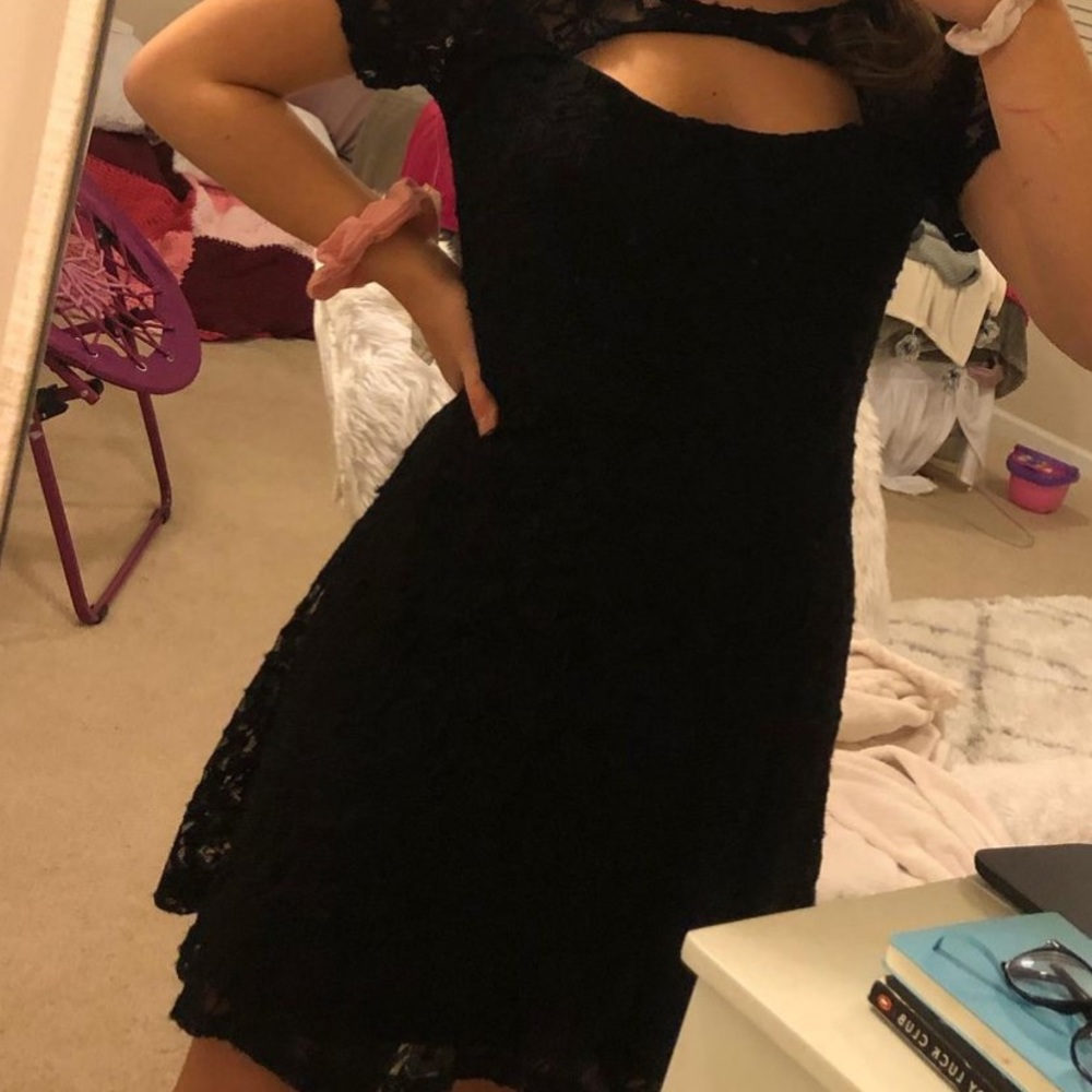 Cute black dress with flower design.